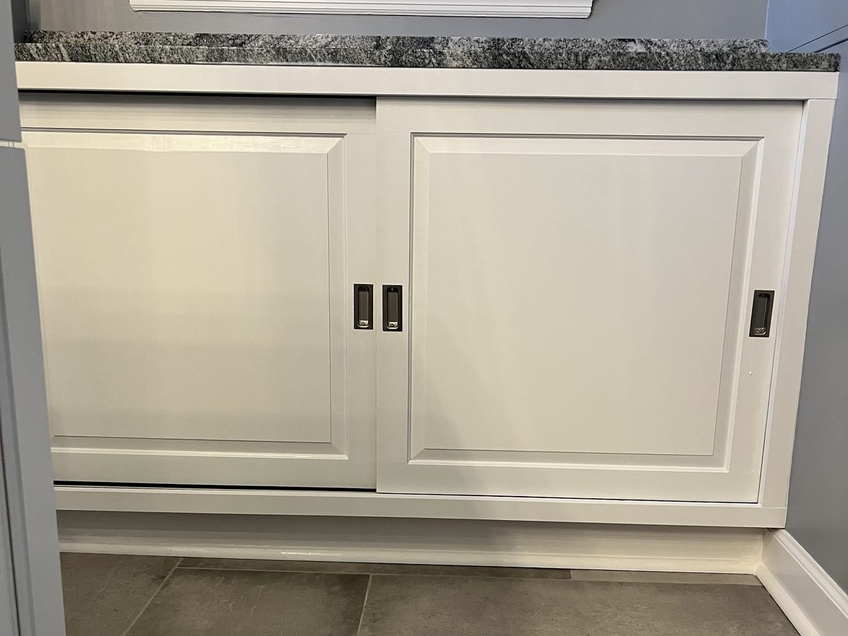 Cabinet with bypass sliding doors